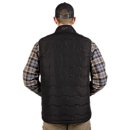 A man wearing a black FREEFLEX™ Lightweight Insulated Vest stands with his back facing the camera. He is also wearing a blue and gray plaid shirt with beige pants, and a black cap. The vest is quilted and appears warm and comfortable.