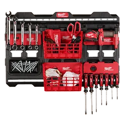 The 6-Piece PACKOUT Shop Storage Kit with 2 Compact Wall Baskets holds various tools, screws, and small storage baskets on a wall mount.