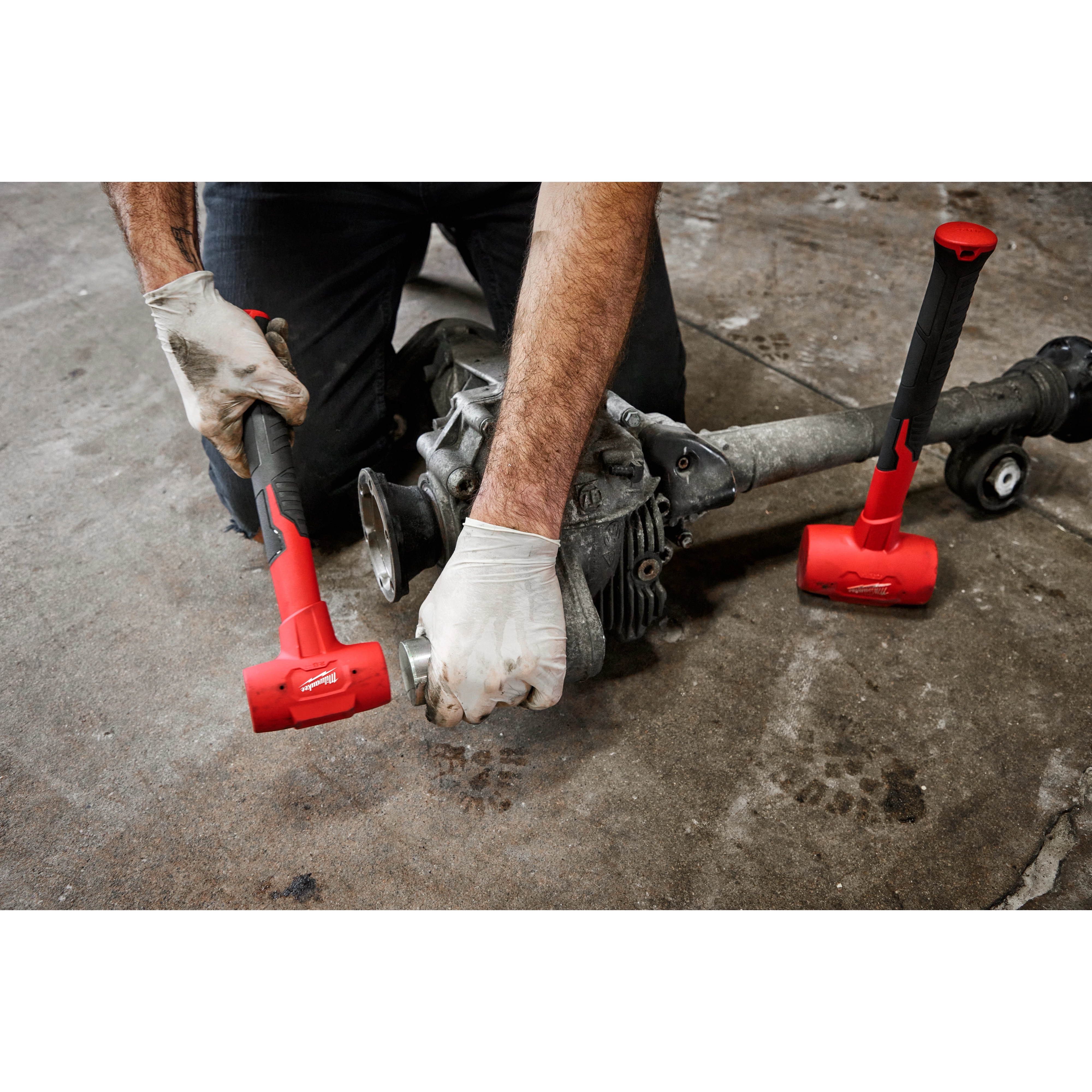Worker using the 32oz Dead Blow Ball Peen Hammer