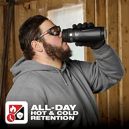 Person wearing gloves sipping from PACKOUT 18oz Insulated Bottle with Sip Lid. Text reads: "ALL-DAY HOT & COLD RETENTION".