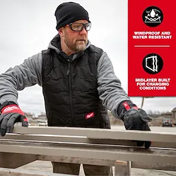 A person wearing the FREEFLEX™ Lightweight Insulated Vest works outdoors; the vest is black with red Milwaukee branding. A product feature panel highlights the vest is windproof, water-resistant, and designed as a midlayer for changing conditions. The person also wears Milwaukee-branded gloves and a grey sweatshirt underneath the vest.