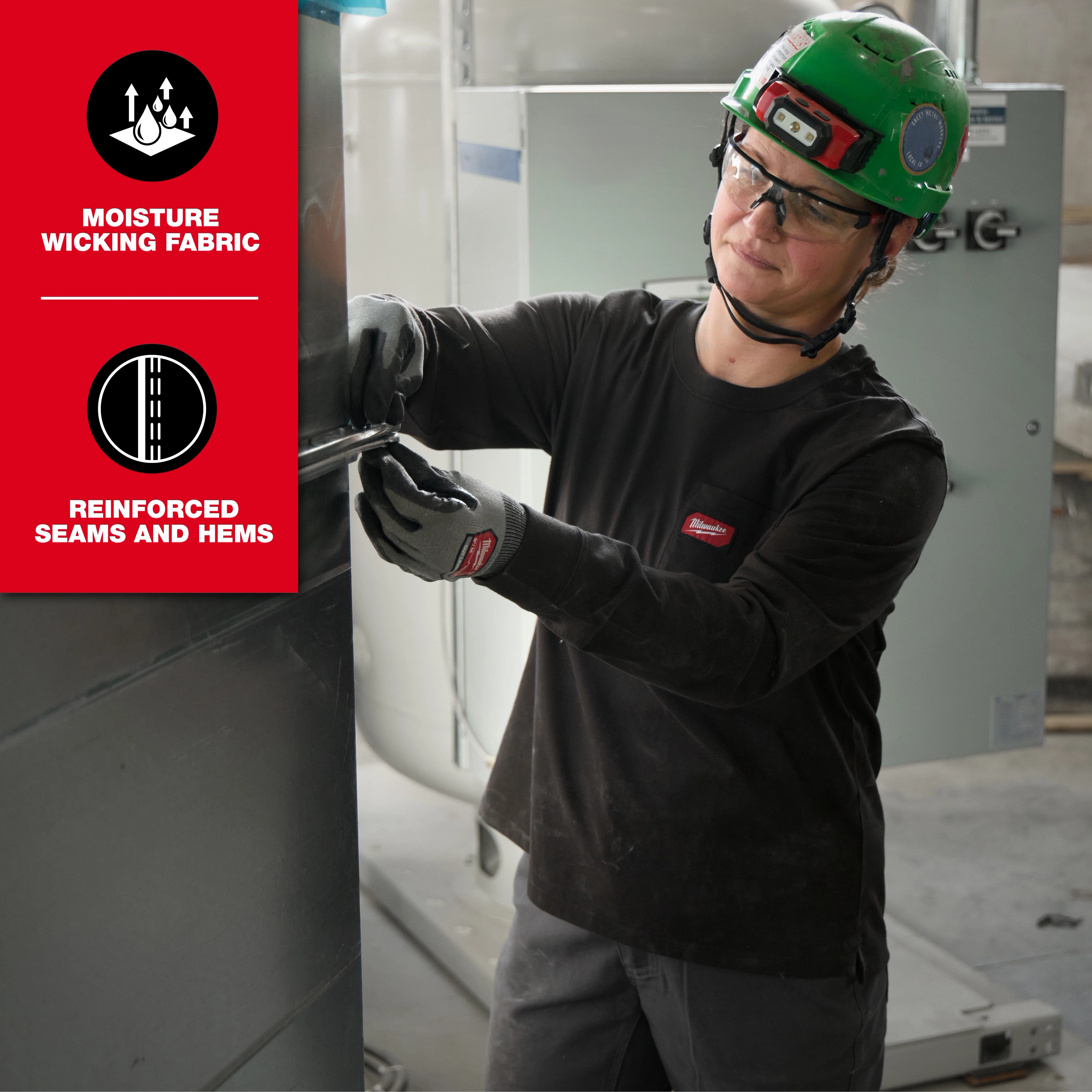 A person wearing a green safety helmet and gloves is working while dressed in a Women’s GRIDIRON™ Pocket T-Shirt - Long Sleeve. The t-shirt features moisture-wicking fabric and reinforced seams and hems as highlighted in the image.