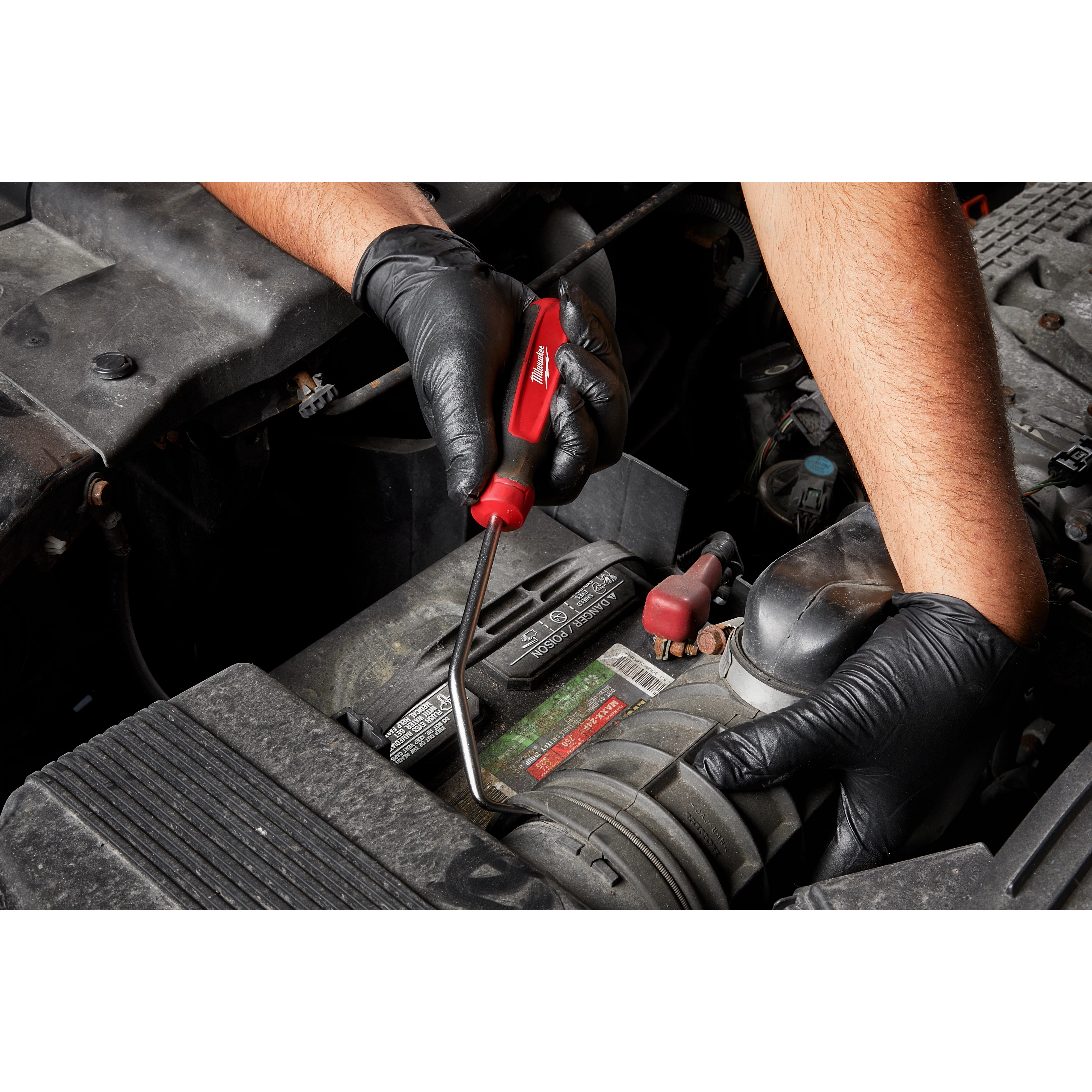 Worker using the Hook and Pick hand tool