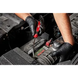 Worker using the Hook and Pick hand tool