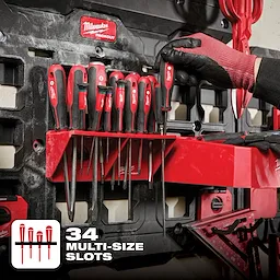 Milwaukee Packout Screwdriver Rack with 34 multi-size slots, holding various red-handled screwdrivers on a black wall mount.