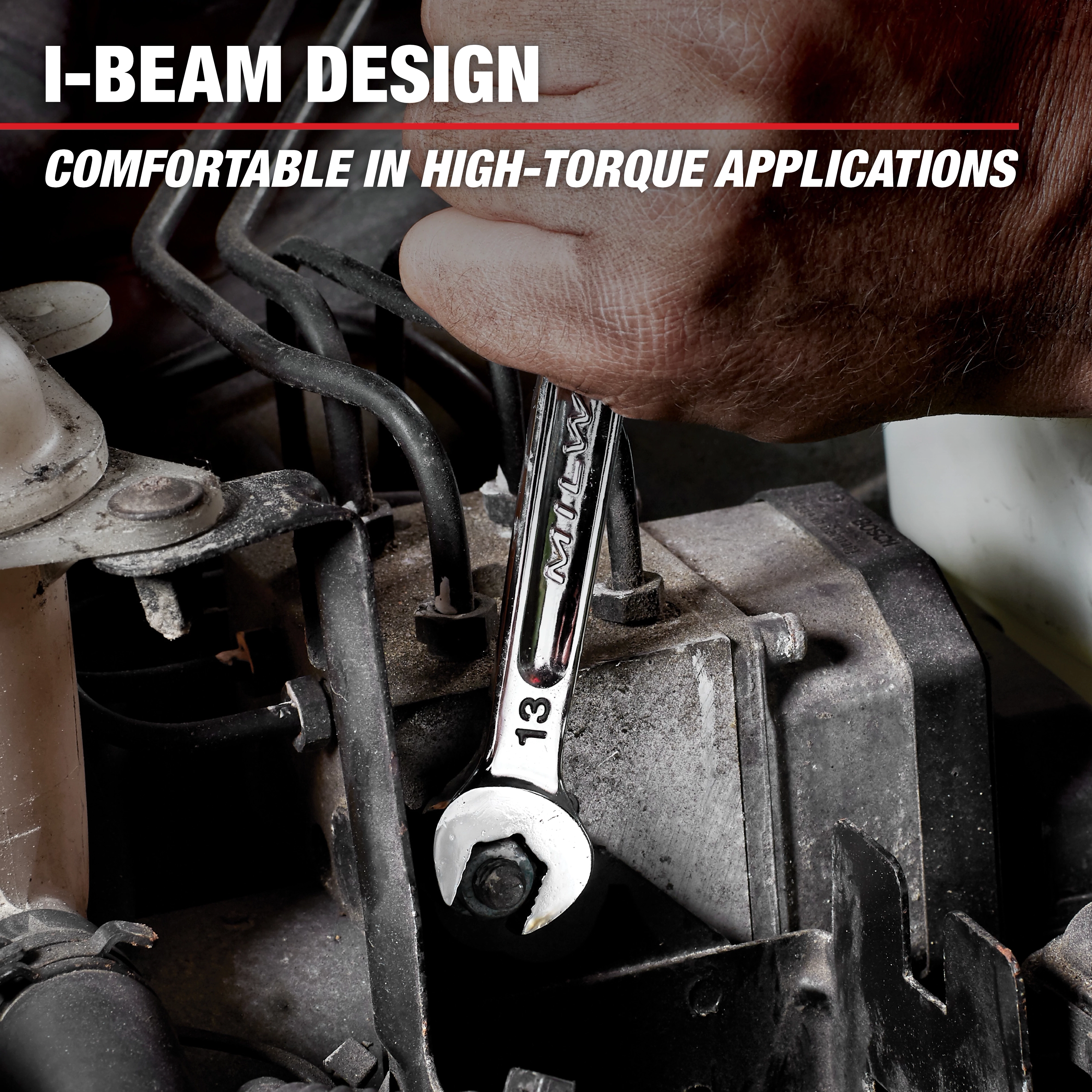 A hand using a Mechanics Hand Tools wrench with an I-Beam design to turn a bolt on a mechanical device. The text highlights the tool's comfort in high-torque applications. The wrench is marked with the number 13.