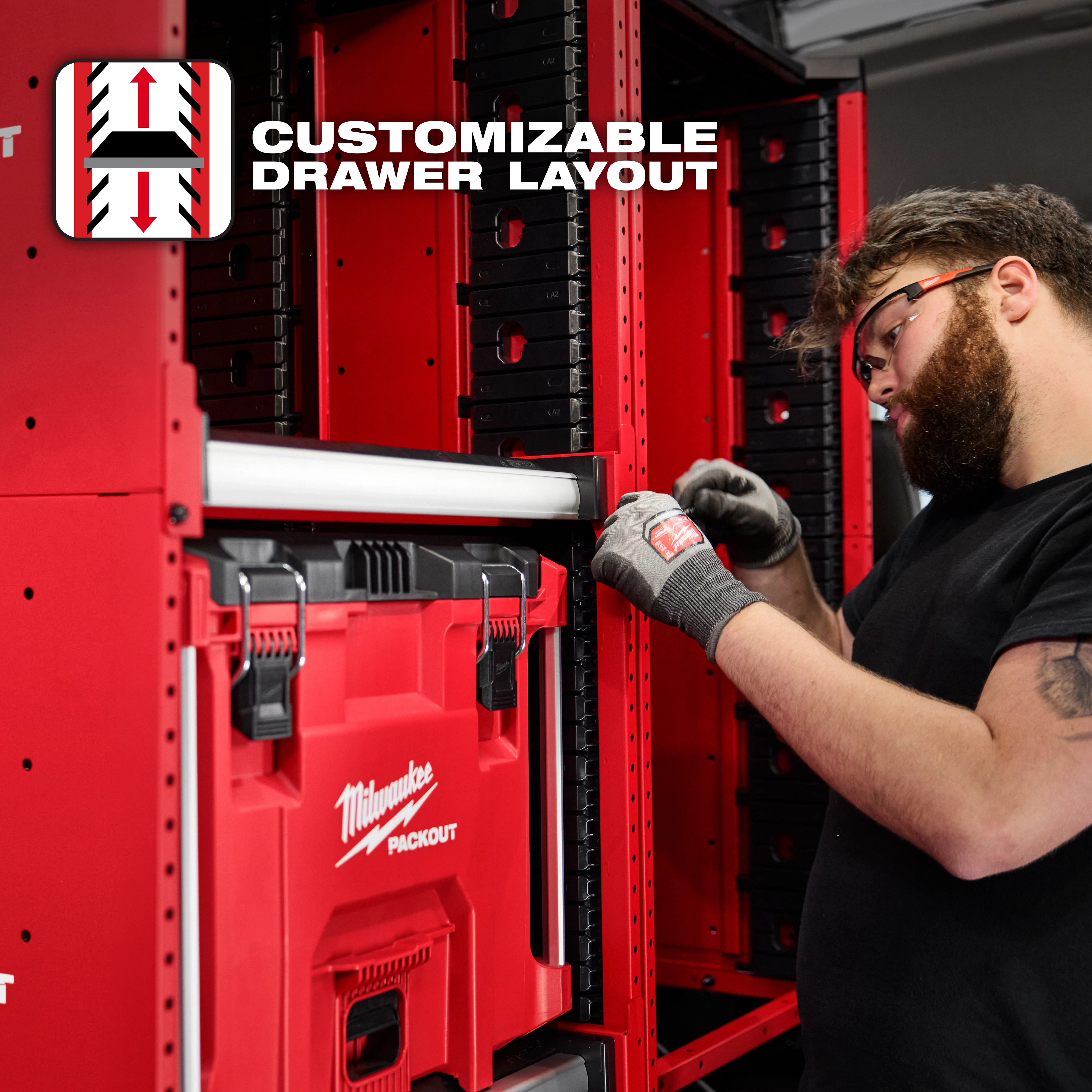 Milwaukee PACKOUT™ Rack with customizable drawer layout. Image shows the red storage system being organized with various compartments and drawers.