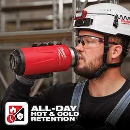 A person wearing a white helmet and work gloves holds a red App%20Shot%20Overlay thermos. Text below reads: "All-Day Hot & Cold Retention".