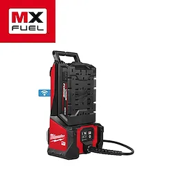 The MX FUEL™ High Cycle Concrete Vibrator Kit from Milwaukee is displayed. The kit includes a red and black power unit with a digital control panel, handle, and connection port for the vibrator head. The MX FUEL™ logo is visible in the top-left corner.