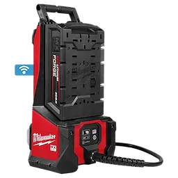 The MX FUEL™ High Cycle Concrete Vibrator Kit by Milwaukee features a red and black design with a handle on top and control buttons at the front. It includes a rechargeable battery and connection ports for attachments.
