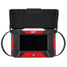 The image shows an M12™ Wireless Monitor. It has a black screen with a red and black protective casing. A textured black cover, featuring a honeycomb pattern, is partially opened above the screen. The Milwaukee logo is visible above the screen.